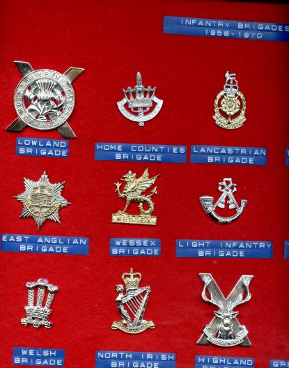 Collection of 15 Anodised Infantry Brigade Cap Badges 1958-70